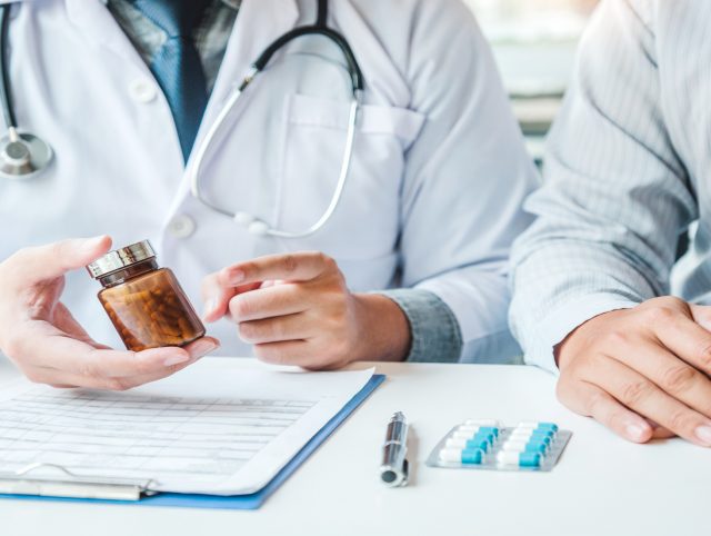 Doctor recommending medication to a patient - DRPs visualisation.