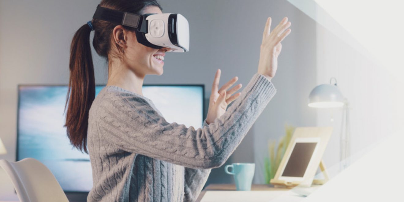 A woman immersed in VR therapy, wearing a virtual reality headset.